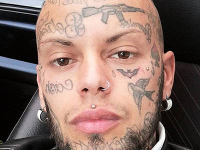 Chi è Daniele Di Bella, dai tatuaggi sulla faccia alla rivelazione sul lavoro