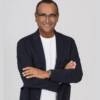 Sanremo 2025, Carlo Conti annuncia le modifiche al regolamento: “Meno canzoni in gara”
